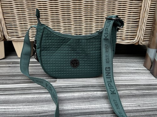 Stunning ladies kipling logo - stunning,
